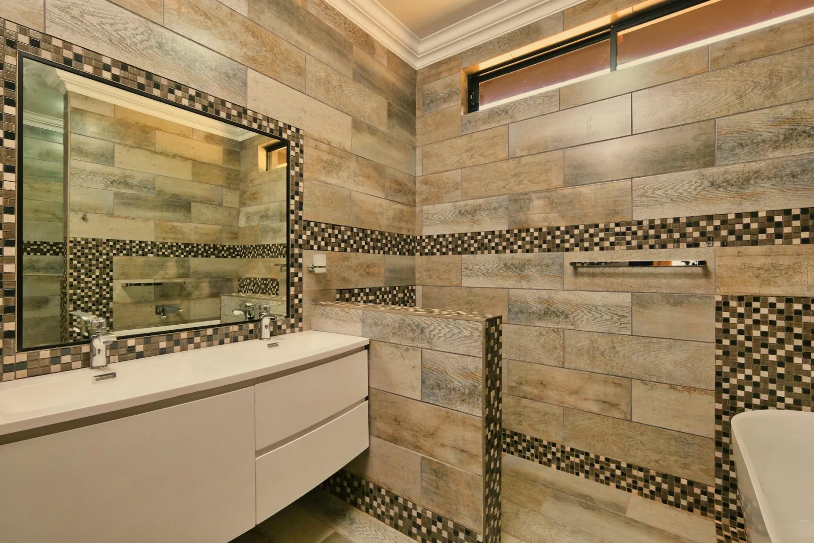 Updated bathroom vanity with modern fixtures and mirror