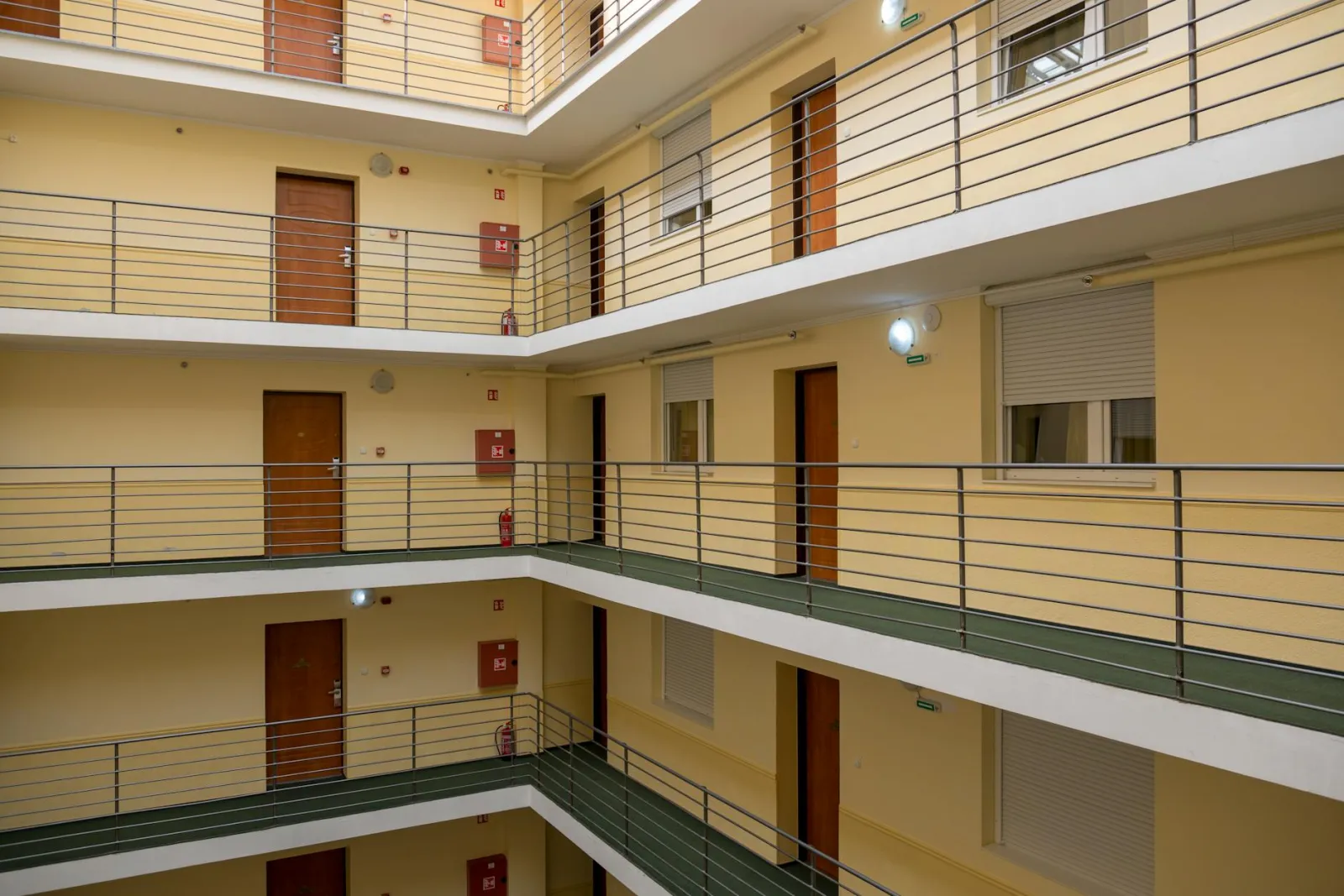 Modern condo building hallway representing strata common property