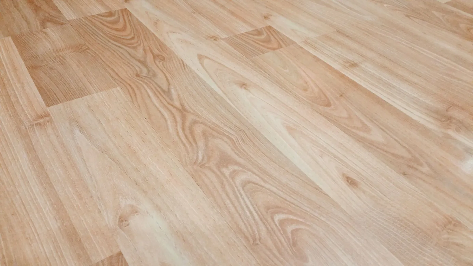 Luxury vinyl plank flooring being installed in a condo