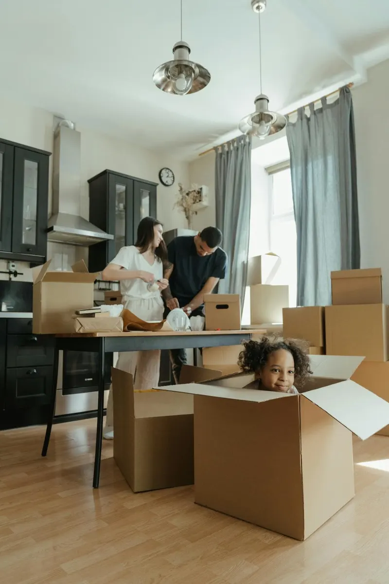 Young couple unpacking in their new home