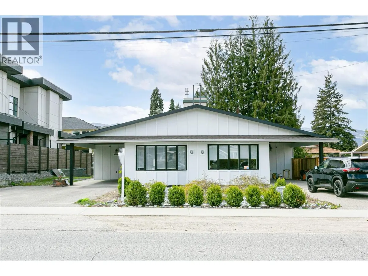 Kelowna Investment Property - Lower Mission Duplex with Pool