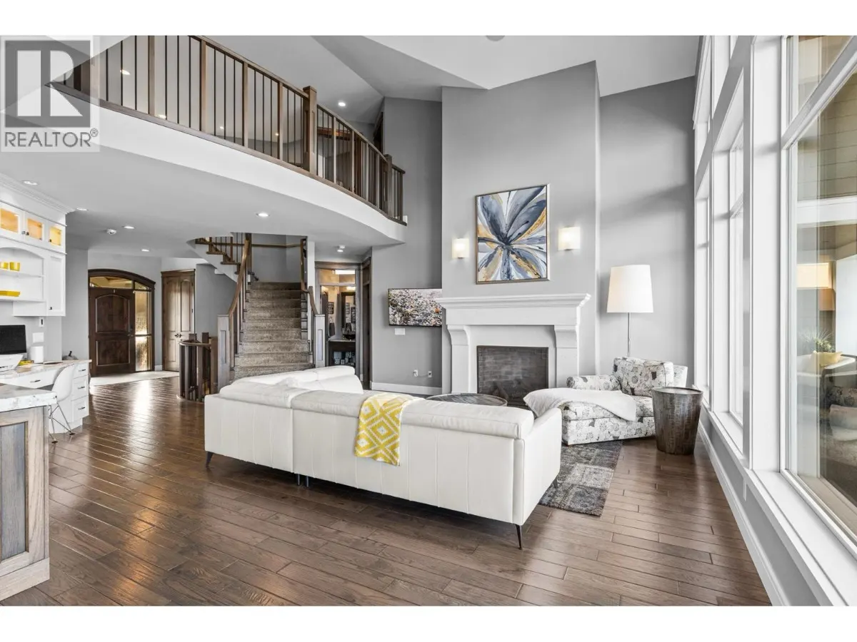 388 Rindle Court two-story great room with balcony overlook, fireplace, and hardwood floors