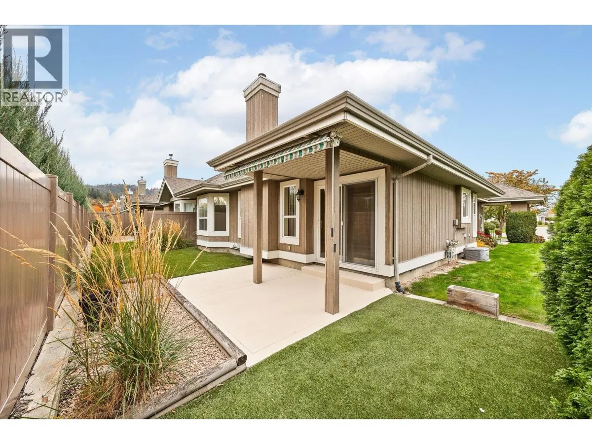 680 Valley Road Unit 12 covered back patio with landscaped yard