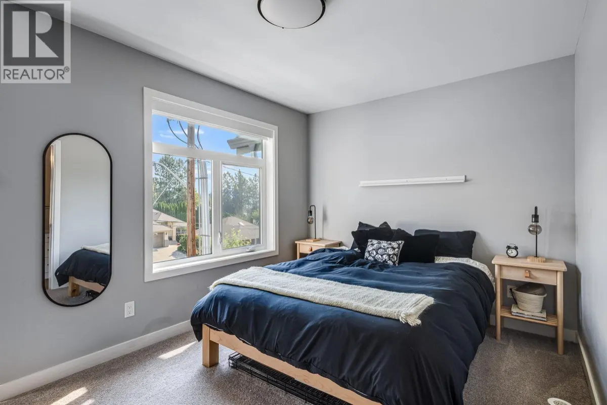 1435 Cara Glen Court Unit 101 bright bedroom with large window