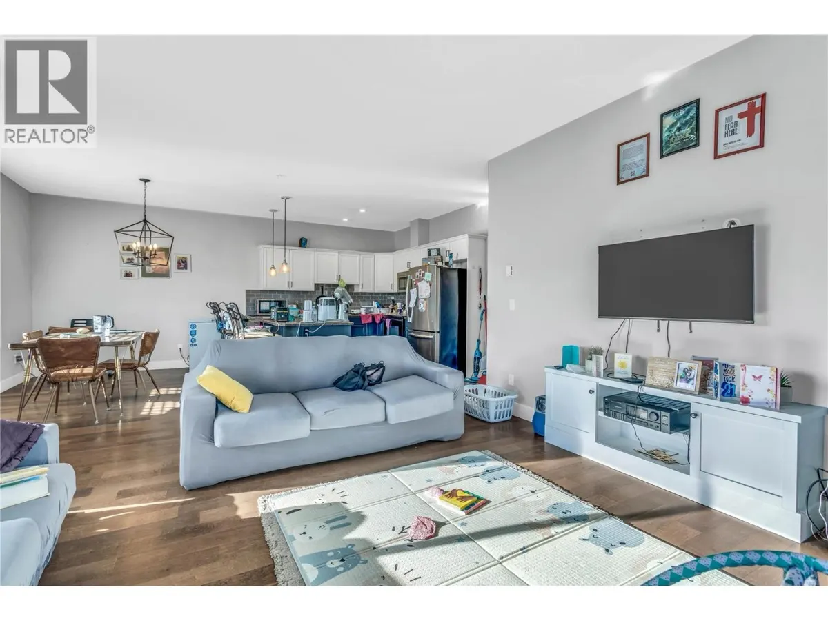 250 Hollywood Road S Unit 302 open concept living room and kitchen with hardwood floors