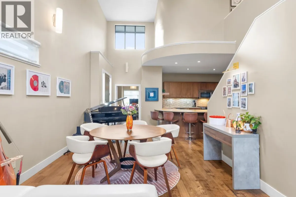 570 Sarsons Road Unit 19 open concept kitchen and dining with vaulted ceilings