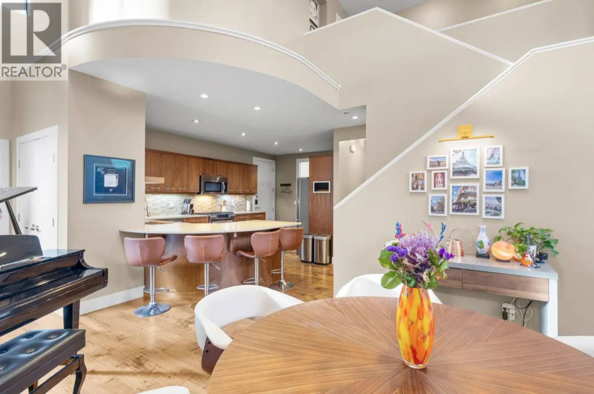 570 Sarsons Road Unit 19 kitchen and dining area with grand piano