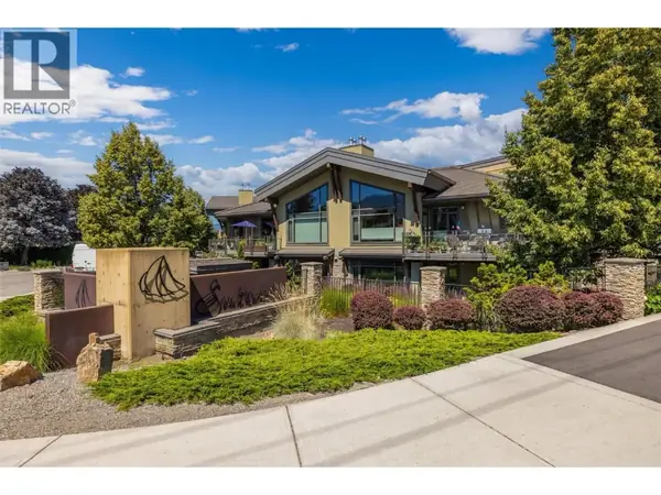 Southwind at Sarsons complex entrance with sailboat logo and landscaped grounds