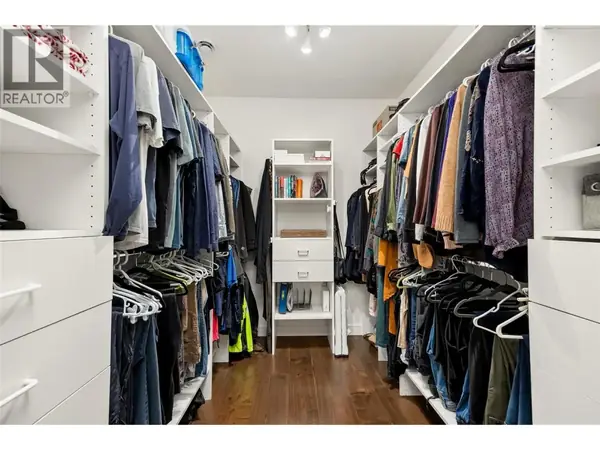 647 Royal Pine Drive custom walk-in closet with built-in organization system