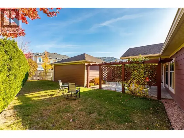 5323 Ptarmigan Street private backyard with detached garage and covered patio